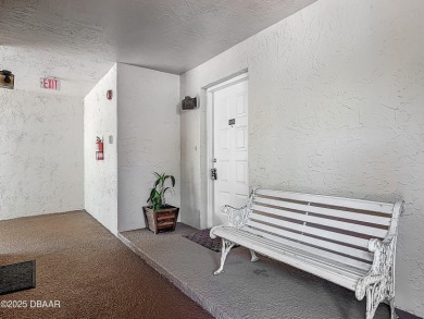 This 3 bedroom 2 bath end corner unit is nestled on the top on Indigo Lakes Golf Club in Florida - for sale on GolfHomes.com, golf home, golf lot