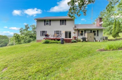 Welcome to this beautifully updated home nestled on a serene on Lake Mohawk Golf Club in Ohio - for sale on GolfHomes.com, golf home, golf lot