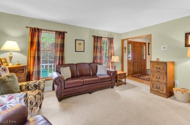 Welcome to this beautifully updated home nestled on a serene on Lake Mohawk Golf Club in Ohio - for sale on GolfHomes.com, golf home, golf lot