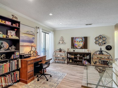 This 3 bedroom 2 bath end corner unit is nestled on the top on Indigo Lakes Golf Club in Florida - for sale on GolfHomes.com, golf home, golf lot