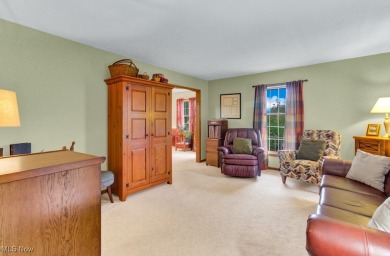 Welcome to this beautifully updated home nestled on a serene on Lake Mohawk Golf Club in Ohio - for sale on GolfHomes.com, golf home, golf lot