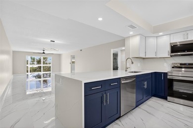 NEWLY RENOVATED EXTRA LARGE CORNER 2BR/2BATH CONDO IN THE SOUGHT on Wynmoor Golf Course in Florida - for sale on GolfHomes.com, golf home, golf lot
