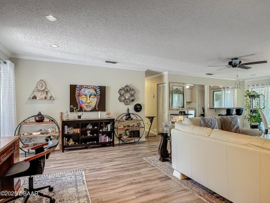 This 3 bedroom 2 bath end corner unit is nestled on the top on Indigo Lakes Golf Club in Florida - for sale on GolfHomes.com, golf home, golf lot