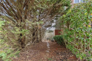 Welcome home to this lovely, spacious home tucked away in a on Hamilton Mill Golf Club in Georgia - for sale on GolfHomes.com, golf home, golf lot