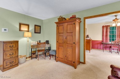 Welcome to this beautifully updated home nestled on a serene on Lake Mohawk Golf Club in Ohio - for sale on GolfHomes.com, golf home, golf lot