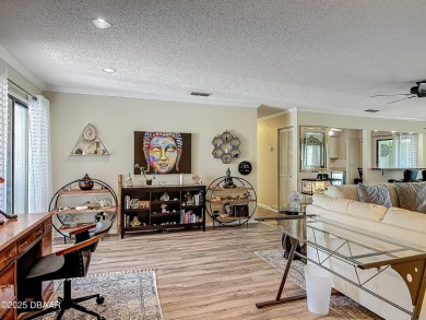 This 3 bedroom 2 bath end corner unit is nestled on the top on Indigo Lakes Golf Club in Florida - for sale on GolfHomes.com, golf home, golf lot