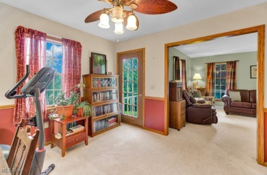 Welcome to this beautifully updated home nestled on a serene on Lake Mohawk Golf Club in Ohio - for sale on GolfHomes.com, golf home, golf lot