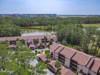 This 3 bedroom 2 bath end corner unit is nestled on the top on Indigo Lakes Golf Club in Florida - for sale on GolfHomes.com, golf home, golf lot