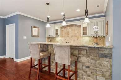 This exquisite Traditional Craftsman home rests near the end of on Traditions of Braselton Golf Club in Georgia - for sale on GolfHomes.com, golf home, golf lot