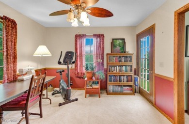 Welcome to this beautifully updated home nestled on a serene on Lake Mohawk Golf Club in Ohio - for sale on GolfHomes.com, golf home, golf lot