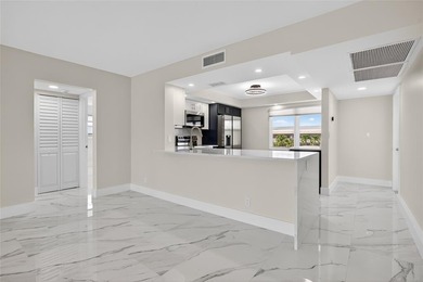 NEWLY RENOVATED EXTRA LARGE CORNER 2BR/2BATH CONDO IN THE SOUGHT on Wynmoor Golf Course in Florida - for sale on GolfHomes.com, golf home, golf lot