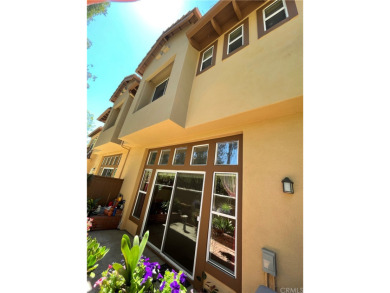 This beautiful two-level town home is located in one of the best on Tustin Ranch Golf Club in California - for sale on GolfHomes.com, golf home, golf lot