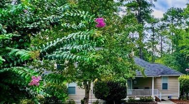 Beautifully updated waterfront townhome with views of the lake on Tara Golf Club At Savannah Lakes in South Carolina - for sale on GolfHomes.com, golf home, golf lot