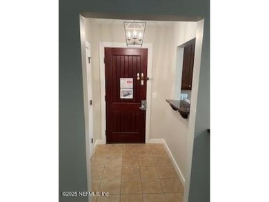 Fully furnished luxury condo with higher vaulted ceilings and on King and Bear Golf Course/World Golf Village in Florida - for sale on GolfHomes.com, golf home, golf lot