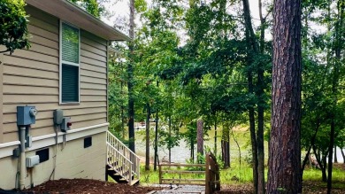 Beautifully updated waterfront townhome with views of the lake on Tara Golf Club At Savannah Lakes in South Carolina - for sale on GolfHomes.com, golf home, golf lot