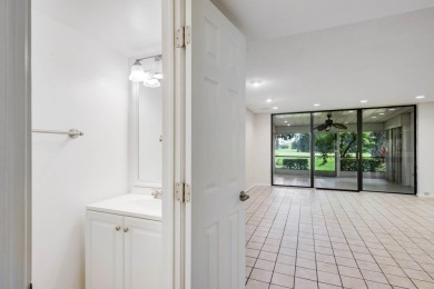 Welcome to this charming 2-bedroom townhouse nestled in a serent on Fountains Golf and Country Club in Florida - for sale on GolfHomes.com, golf home, golf lot