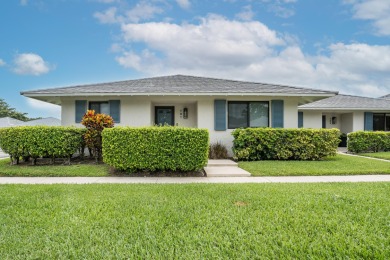 This turnkey 2-Bedroom, 2-bathroom corner unit townhouse in the on PGA National Golf Club in Florida - for sale on GolfHomes.com, golf home, golf lot