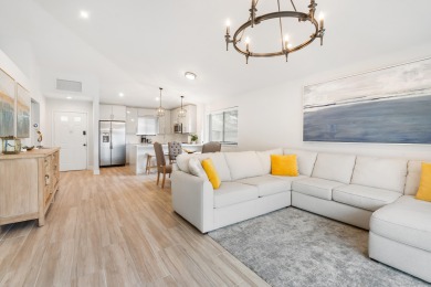 This turnkey 2-Bedroom, 2-bathroom corner unit townhouse in the on PGA National Golf Club in Florida - for sale on GolfHomes.com, golf home, golf lot