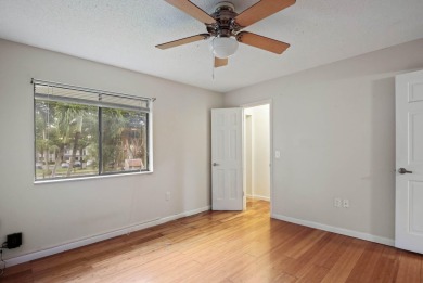Welcome to this charming 2-bedroom townhouse nestled in a serent on Fountains Golf and Country Club in Florida - for sale on GolfHomes.com, golf home, golf lot