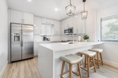 This turnkey 2-Bedroom, 2-bathroom corner unit townhouse in the on PGA National Golf Club in Florida - for sale on GolfHomes.com, golf home, golf lot