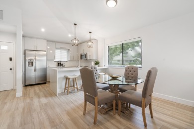 This turnkey 2-Bedroom, 2-bathroom corner unit townhouse in the on PGA National Golf Club in Florida - for sale on GolfHomes.com, golf home, golf lot