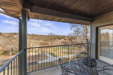 Discover luxury living in this beautifully remodeled 2-bedroom on Ledgestone Country Club and Golf Course in Missouri - for sale on GolfHomes.com, golf home, golf lot