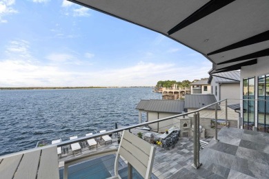 Discover the epitome of lakeside living at 402 Lighthouse Drive on Slick Rock Golf Course - Horseshoe Bay in Texas - for sale on GolfHomes.com, golf home, golf lot