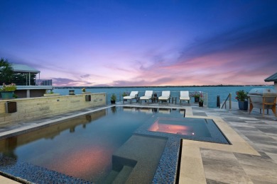 Discover the epitome of lakeside living at 402 Lighthouse Drive on Slick Rock Golf Course - Horseshoe Bay in Texas - for sale on GolfHomes.com, golf home, golf lot