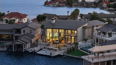 Discover the epitome of lakeside living at 402 Lighthouse Drive on Slick Rock Golf Course - Horseshoe Bay in Texas - for sale on GolfHomes.com, golf home, golf lot