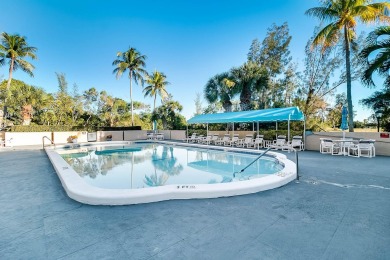 Welcome to this charming 2-bedroom townhouse nestled in a serent on Fountains Golf and Country Club in Florida - for sale on GolfHomes.com, golf home, golf lot
