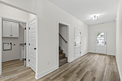 **NOW OFFERING $5,000 USE AS YOU CHOOSE** New construction on on Rock Creek Country Club in North Carolina - for sale on GolfHomes.com, golf home, golf lot