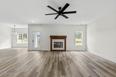 New construction on the 8th hole at Rock Creek! This home offers on Rock Creek Country Club in North Carolina - for sale on GolfHomes.com, golf home, golf lot