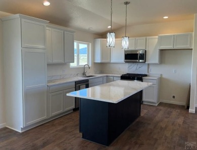 Fantastic open floor plan ranch home. Walkout basement partially on Hollydot Golf Course in Colorado - for sale on GolfHomes.com, golf home, golf lot
