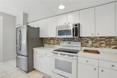 Spacious First-Floor Condo with Lake  Golf Course Views in The on Breckenridge Golf and Country Club in Florida - for sale on GolfHomes.com, golf home, golf lot