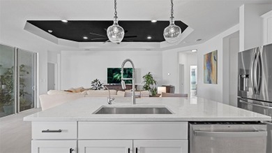 Pool home ~ nestled within the coveted Windward community in on The Founders Golf Club in Florida - for sale on GolfHomes.com, golf home, golf lot