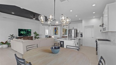 Pool home ~ nestled within the coveted Windward community in on The Founders Golf Club in Florida - for sale on GolfHomes.com, golf home, golf lot