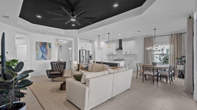 Pool home ~ nestled within the coveted Windward community in on The Founders Golf Club in Florida - for sale on GolfHomes.com, golf home, golf lot