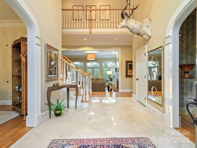 Exquisite Custom-built Estate, perfectly nestled in the on TPC at Piper Glen in North Carolina - for sale on GolfHomes.com, golf home, golf lot