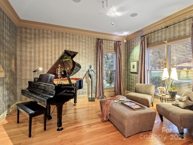 Exquisite Custom-built Estate, perfectly nestled in the on TPC at Piper Glen in North Carolina - for sale on GolfHomes.com, golf home, golf lot