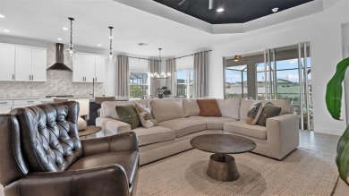 Pool home ~ nestled within the coveted Windward community in on The Founders Golf Club in Florida - for sale on GolfHomes.com, golf home, golf lot