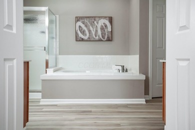 Welcome home to this beautifully updated 4-bedroom, 2.5-bath on Kinsale Golf and Fitness Club in Ohio - for sale on GolfHomes.com, golf home, golf lot