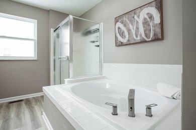 Welcome home to this beautifully updated 4-bedroom, 2.5-bath on Kinsale Golf and Fitness Club in Ohio - for sale on GolfHomes.com, golf home, golf lot