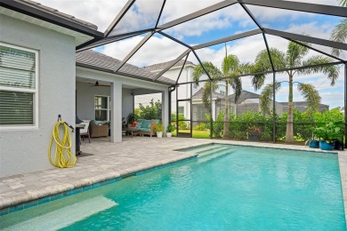Pool home ~ nestled within the coveted Windward community in on The Founders Golf Club in Florida - for sale on GolfHomes.com, golf home, golf lot