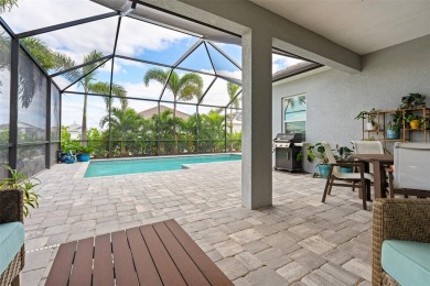 Pool home ~ nestled within the coveted Windward community in on The Founders Golf Club in Florida - for sale on GolfHomes.com, golf home, golf lot