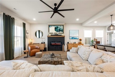 Modern design meets luxury living in this impressive 4-bedroom on Big Sugar Golf Club in Arkansas - for sale on GolfHomes.com, golf home, golf lot