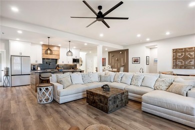 Modern design meets luxury living in this impressive 4-bedroom on Big Sugar Golf Club in Arkansas - for sale on GolfHomes.com, golf home, golf lot