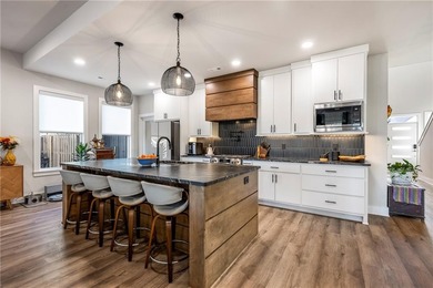 Modern design meets luxury living in this impressive 4-bedroom on Big Sugar Golf Club in Arkansas - for sale on GolfHomes.com, golf home, golf lot