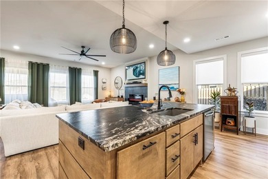 Modern design meets luxury living in this impressive 4-bedroom on Big Sugar Golf Club in Arkansas - for sale on GolfHomes.com, golf home, golf lot