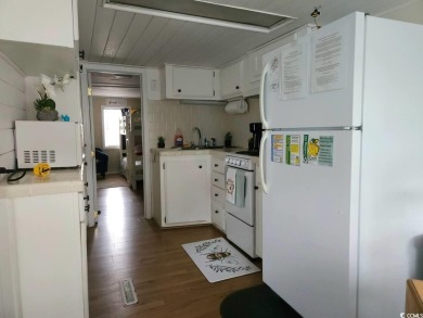 Ready to own a Cozy 2BR/2BA beach bungalow located within the on Prestwick Country Club in South Carolina - for sale on GolfHomes.com, golf home, golf lot