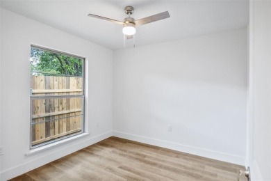 Step into modern elegance with this beautifully renovated home on Cedar Crest Golf Course in Texas - for sale on GolfHomes.com, golf home, golf lot
